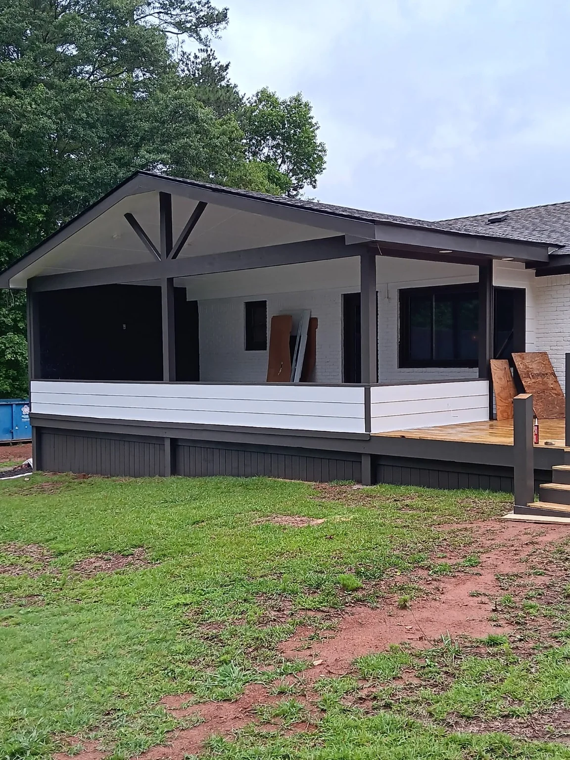 Finished covered patio by Plus Home Investment